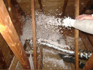 Blowing insulation into attic